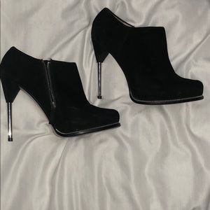 Black faux suede platform heeled shooties.